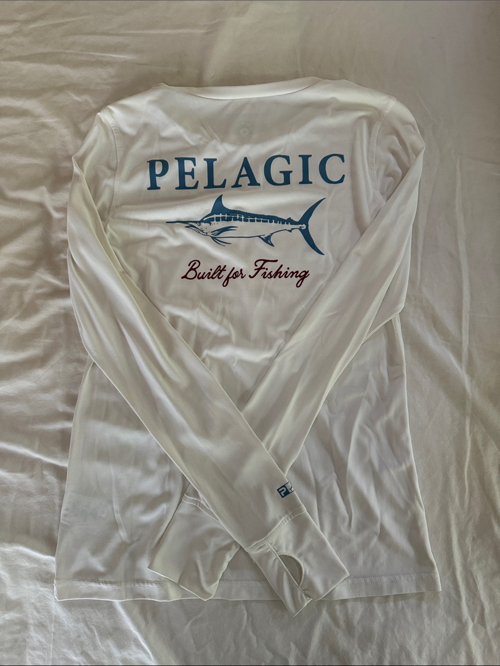 Pelagic White Long Sleeve Fishing Tee with Blue Marlin Logo